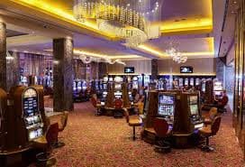 Big Time Gaming slot interface on gatcha platform showing reel layout and bet controls